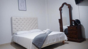Déjate envolver por Cali tu acogedor apartamento en el centro, listo para recibirte